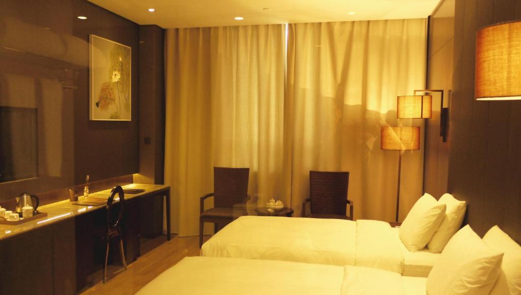 XI Yu Hotel Kuangcsou Szoba fotó